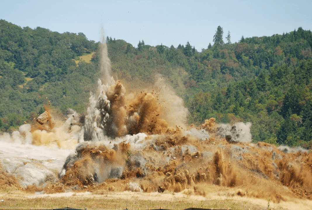 Blasting technique used to break rock into smaller pieces.